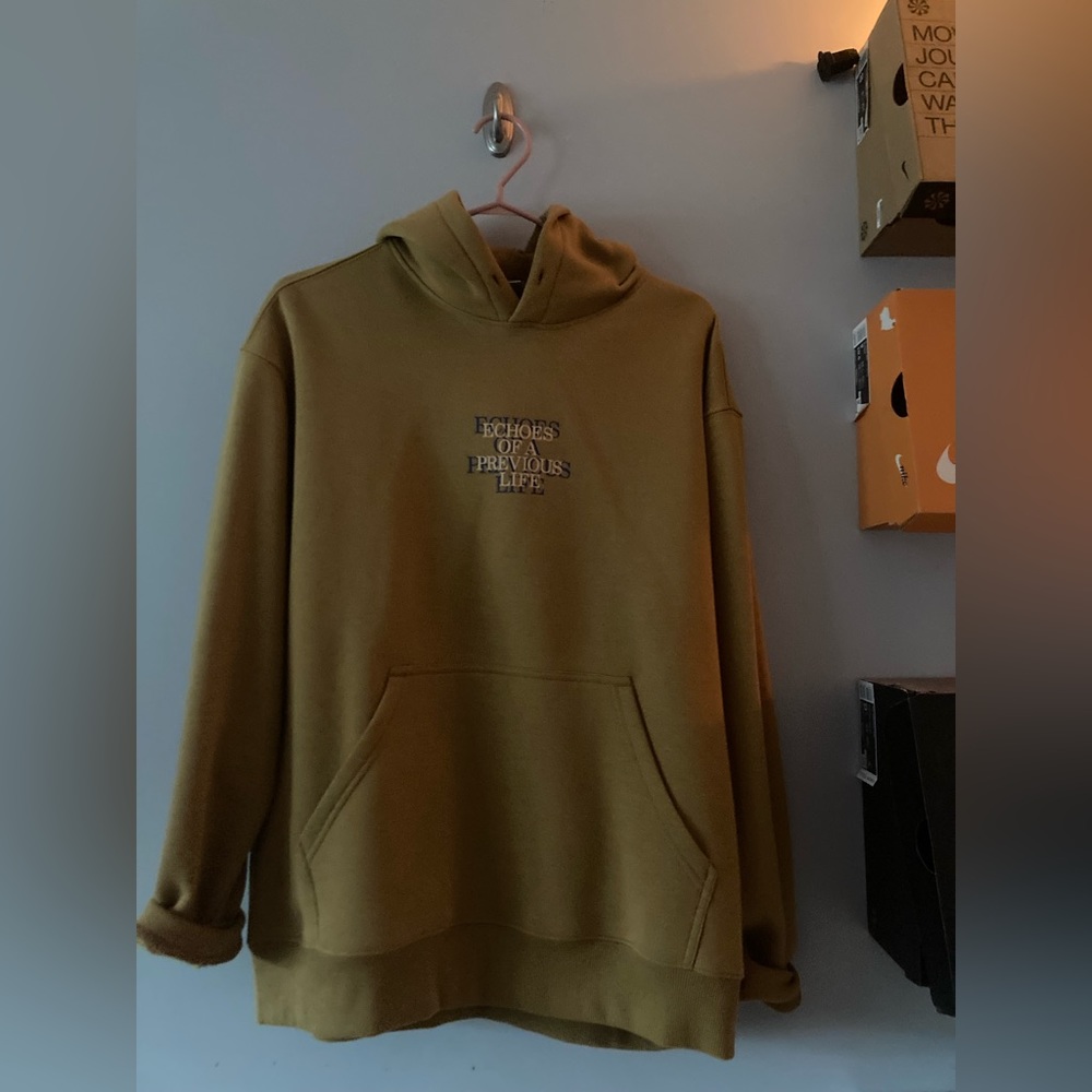 H&M hoodie ‘echoes of a previous life’
